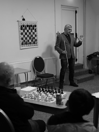 Professional chess master giving a lecture